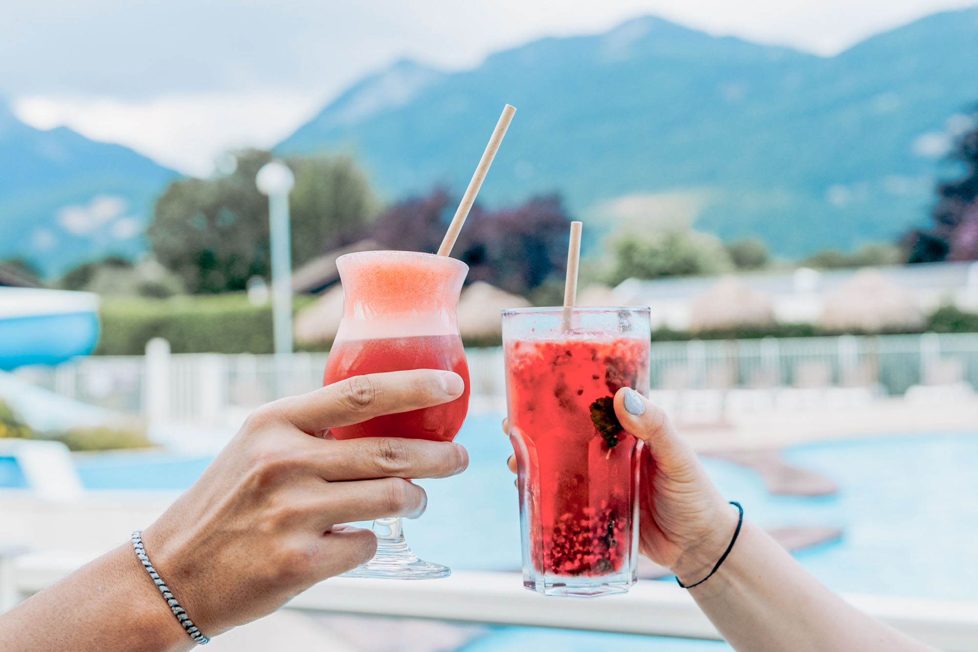 bar and cocktails by the pool at the Doussard campsite